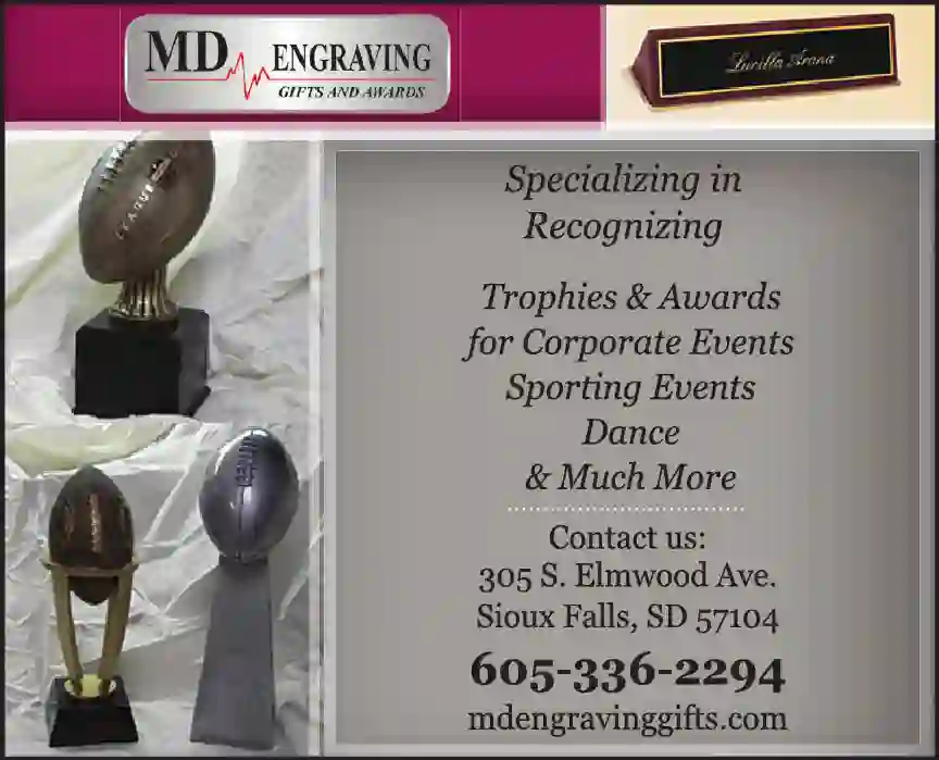 Trophies print ad for M D Engraving Specialists Inc